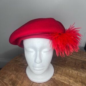 Elegant Red Beret with Feather Accent